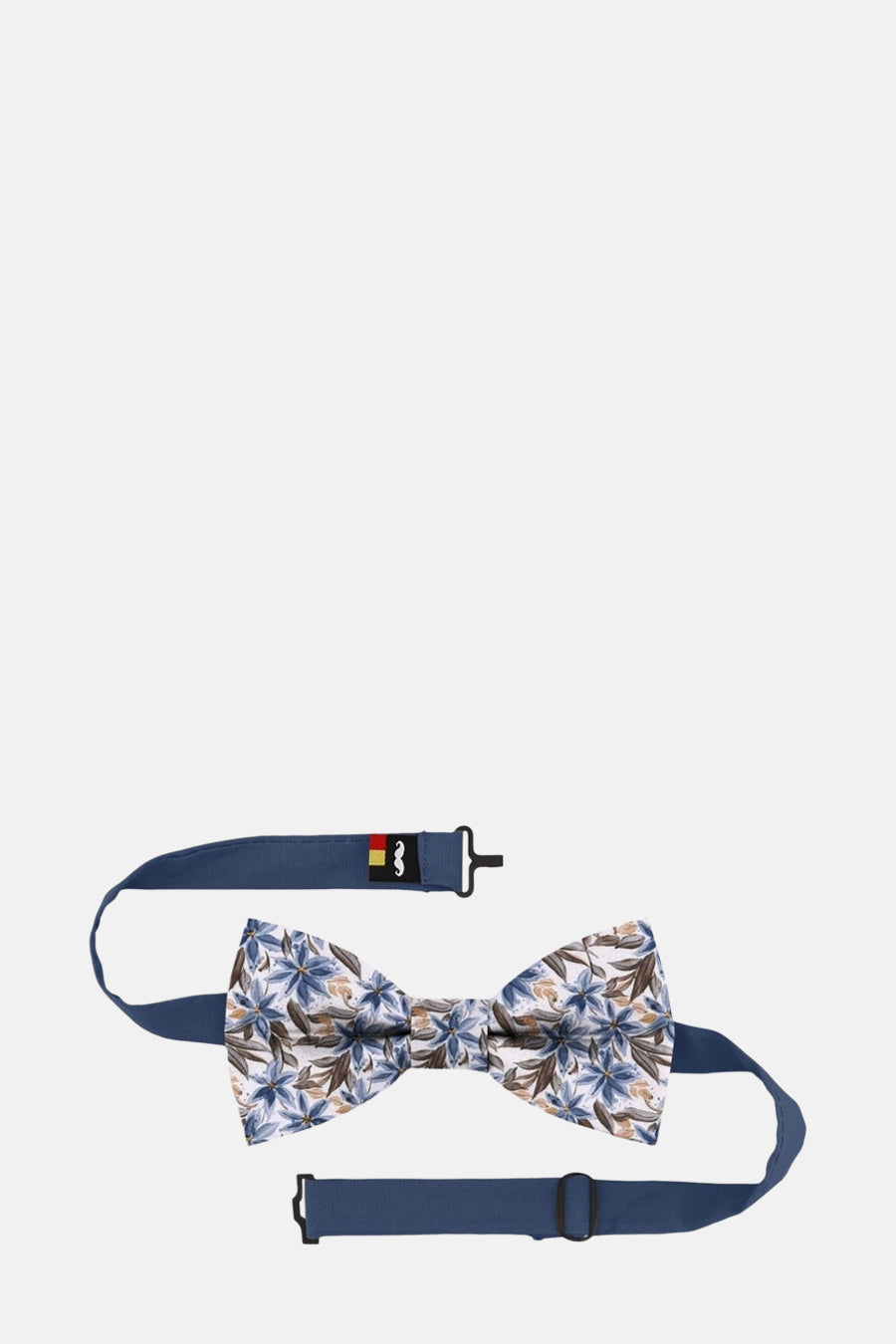 Multikleurige vlinderdas van MR. CELESTIN, met blauw en bruin bloemenpatroon, met een marineblauwe nekband.