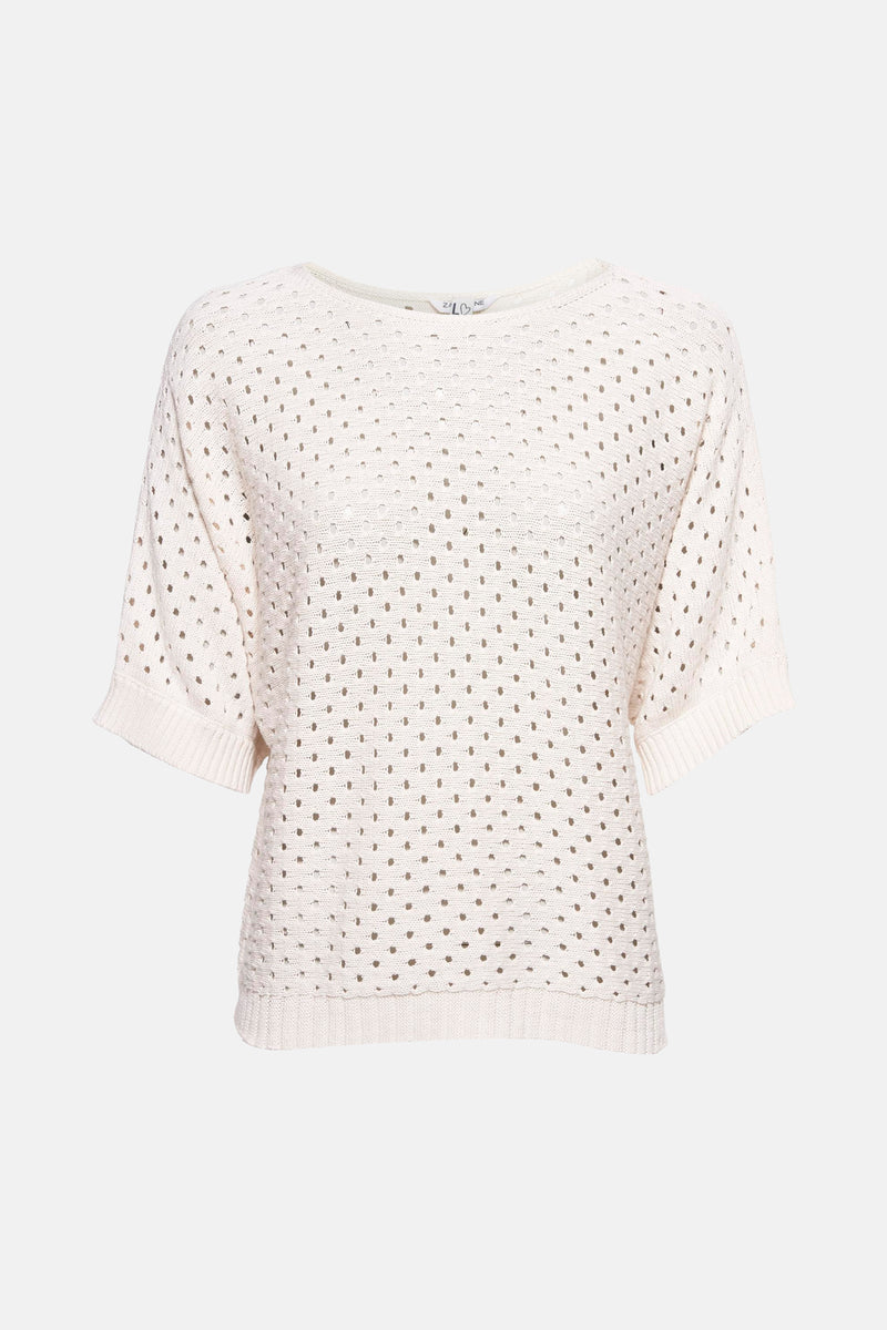 Pull écru ajouré de ZABAIONE, à manches courtes, en maille tricotée avec motifs perforés.
