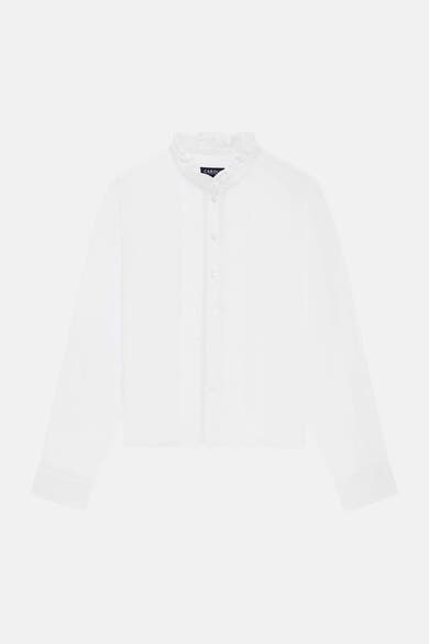 Chemise blanche à manches longues de CAROLL, avec col montant à volants et fermeture boutonnée.

