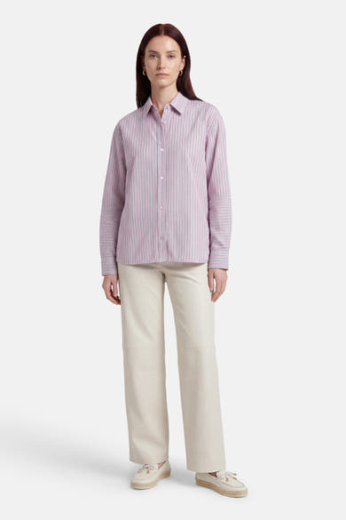 Chemise rose à rayures by ADORE, avec des manches longues et une coupe décontractée.