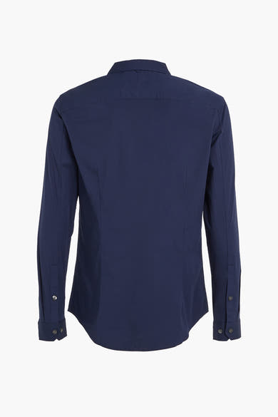 Chemise à manches longues bleue par Tommy Jeans, vue de dos avec boutons aux poignets.
