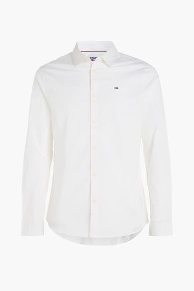 Chemise blanche à manches longues de Tommy Jeans, avec logo discret sur la poitrine.