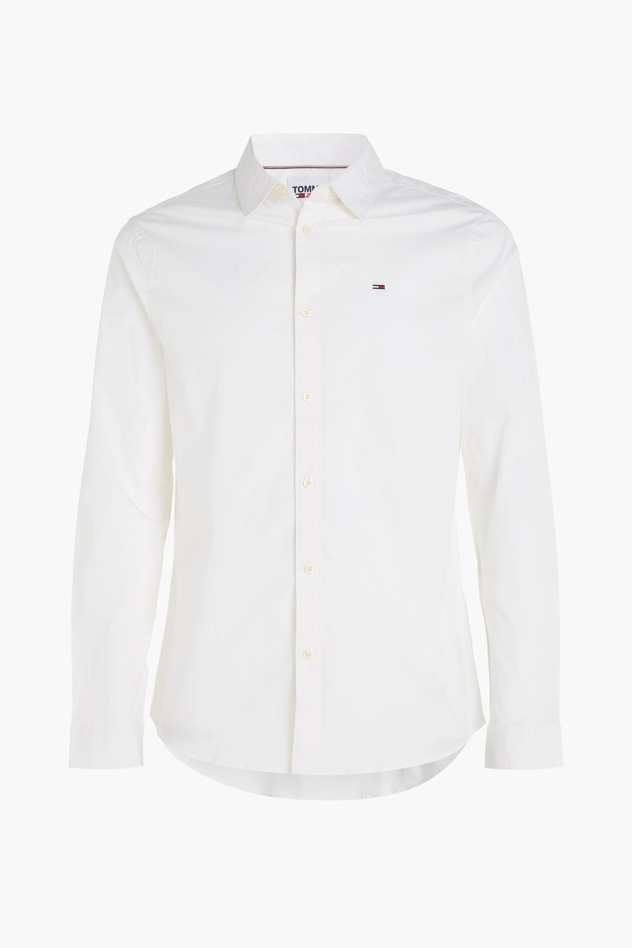 Chemise blanche à manches longues de Tommy Jeans, avec logo discret sur la poitrine.