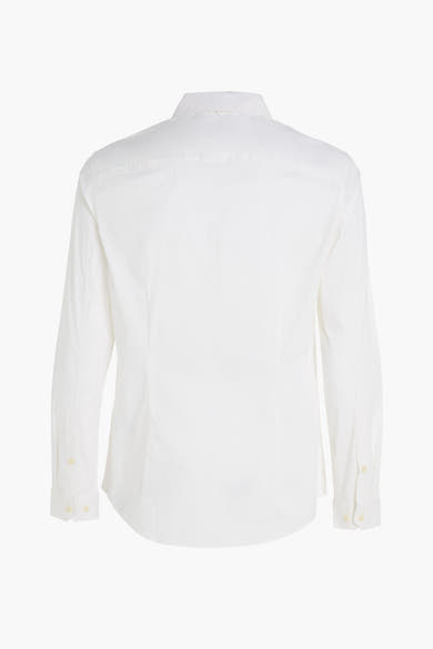 Chemise à manches longues blanche de Tommy Jeans, vue de dos, avec coupe ajustée et détails discrets.
