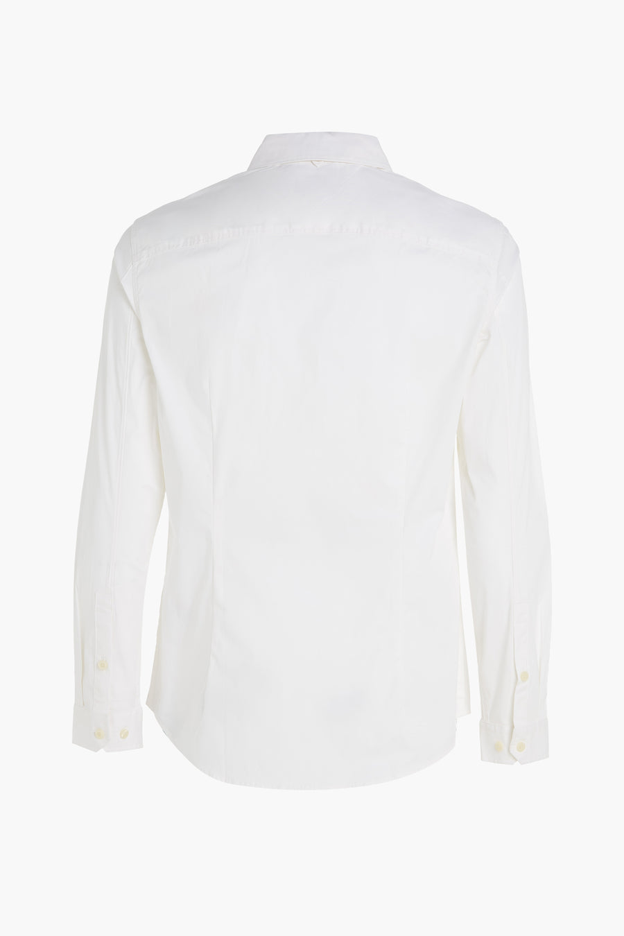 Chemise à manches longues blanche de Tommy Jeans, vue de dos, avec coupe ajustée et détails discrets.
