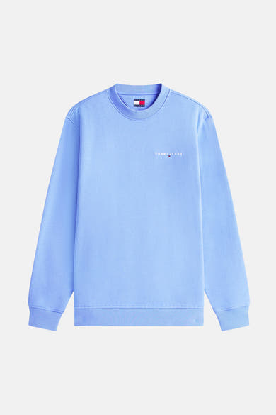 Blauwe sweater van TOMMY JEANS, met een geborduurd logo op de borst en geribbelde manchetten.