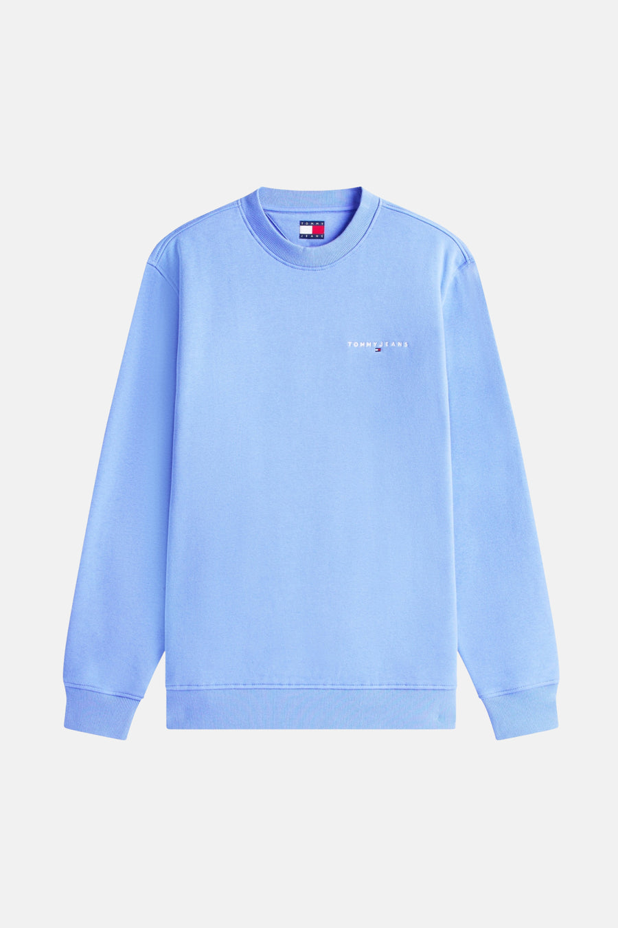 Blauwe sweater van TOMMY JEANS, met een geborduurd logo op de borst en geribbelde manchetten.