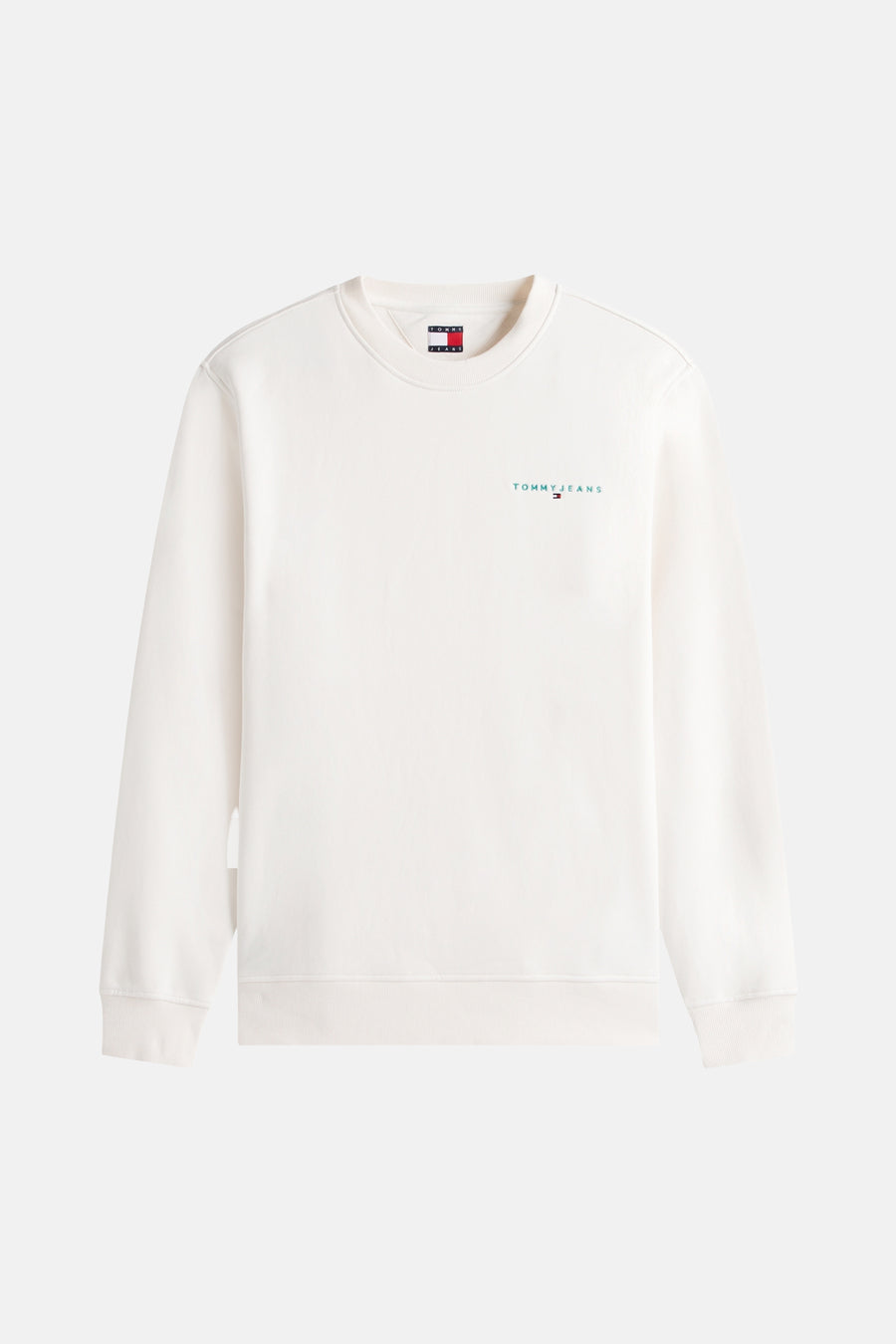 Sweat ras du cou blanc de Tommy Jeans, avec un petit logo brodé sur la poitrine.