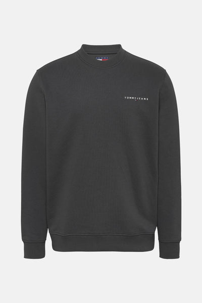 Zwarte rondehals sweatshirt van TOMMY JEANS, met discreet logo op de borst.