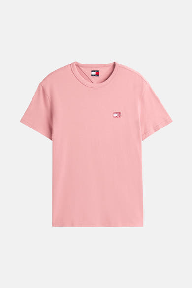 T-shirt rose à manches courtes de TOMMY JEANS, avec logo carré sur la poitrine et col rond.

