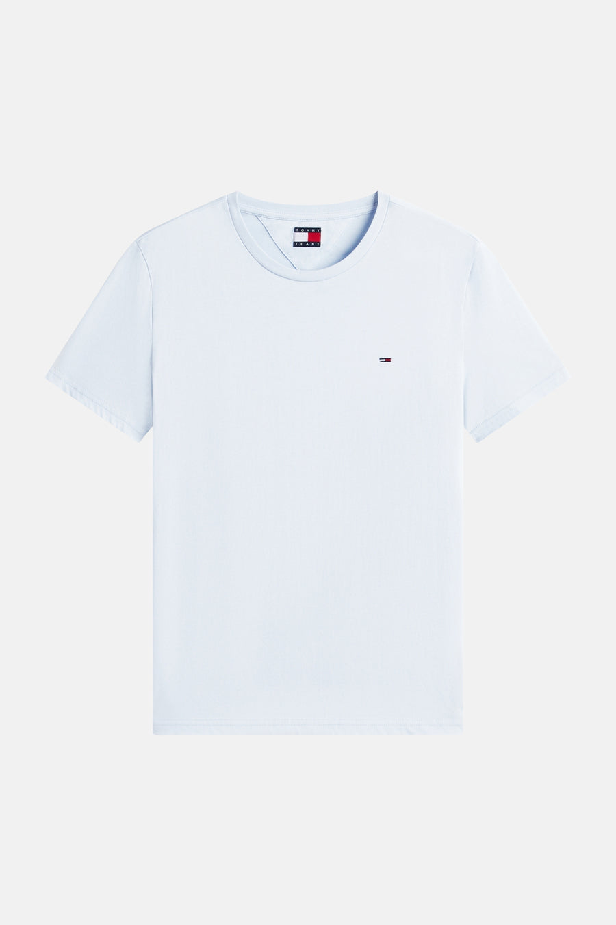 T-shirt bleu à manches courtes de TOMMY JEANS, avec petit logo sur la poitrine et étiquette logotée au col.