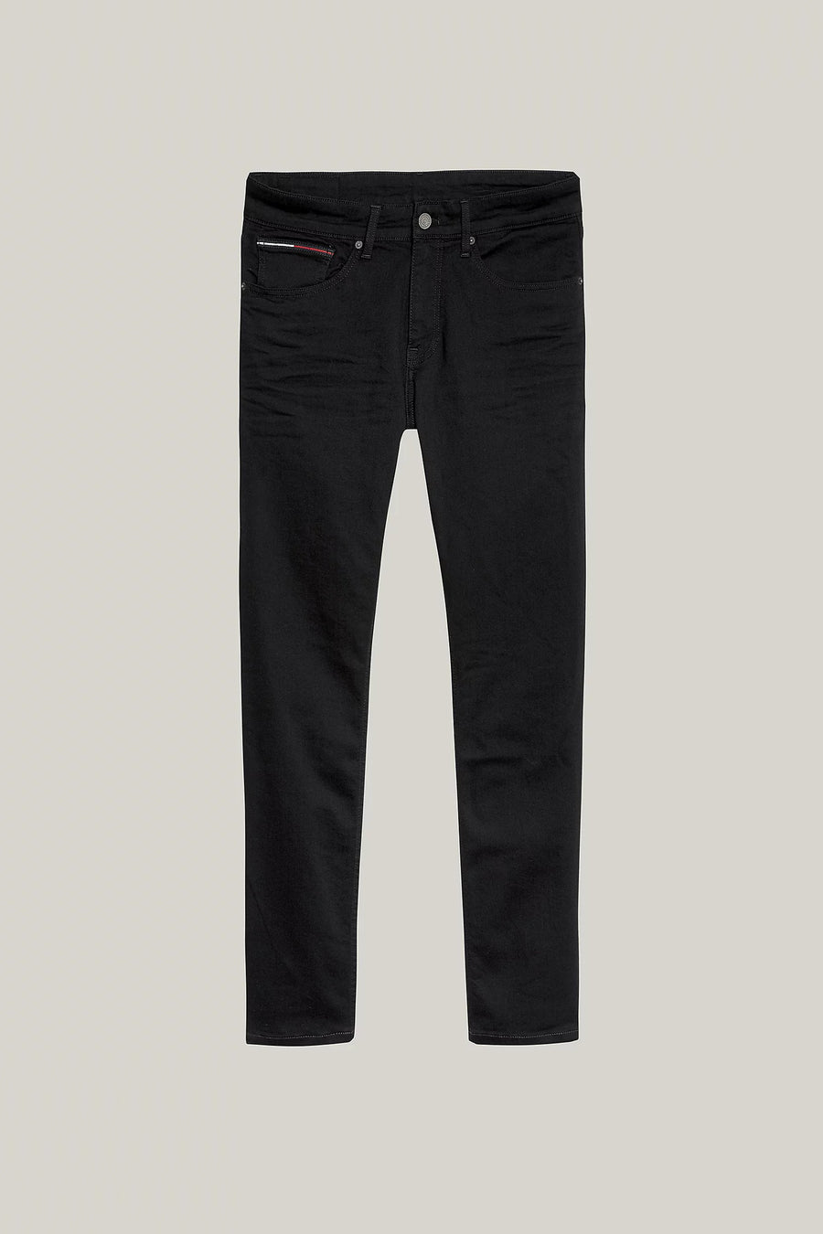Jean fuselé noir de TOMMY JEANS, avec logo subtil sur la poche gousset.