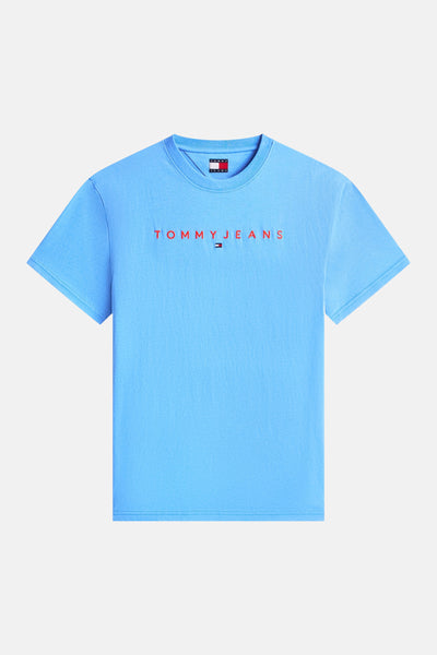 Light blue short-sleeve t-shirt by Tommy Jeans with red embroidered logo and flag tag, front view