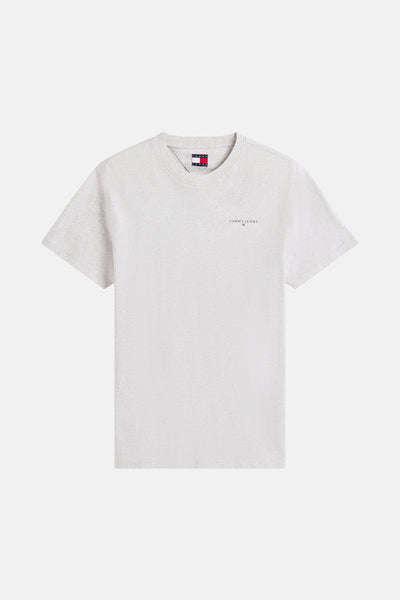 T-shirt à manches courtes gris chiné de Tommy Jeans, avec logo discret sur la poitrine.
