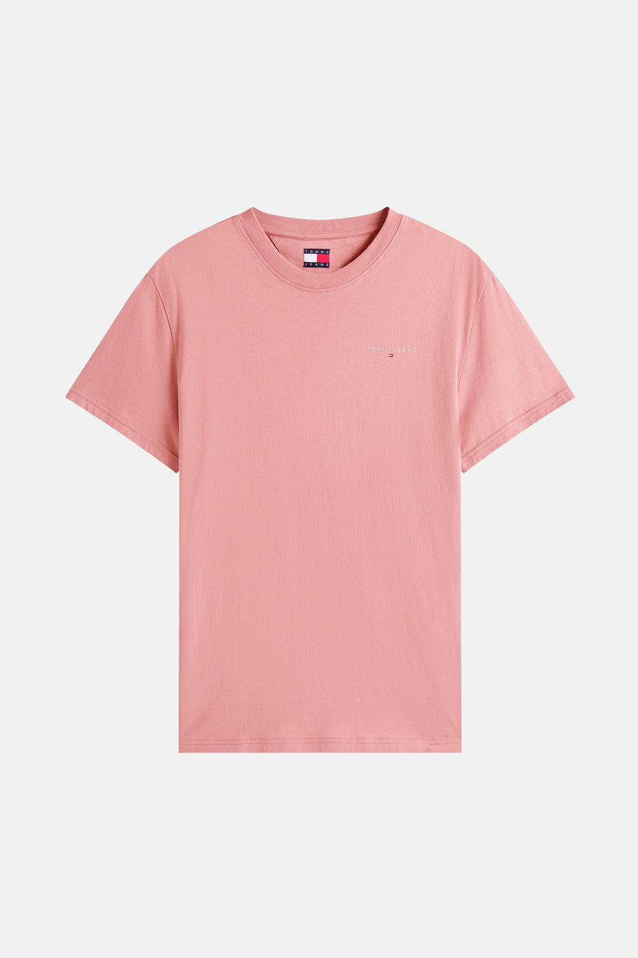T-shirt à manches courtes rose de TOMMY JEANS avec logo discret sur la poitrine.