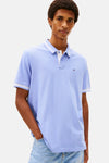 Polo à manches courtes mauve de TOMMY JEANS avec col et bordures de manches rayés.