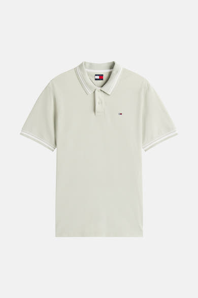Polo à manches courtes vert de TOMMY JEANS avec rayures blanches au col et aux manches.