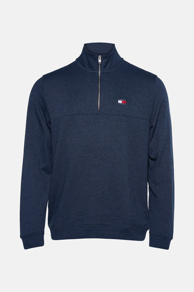 Pull à col roulé bleu de TOMMY JEANS avec fermeture éclair et logo discret.