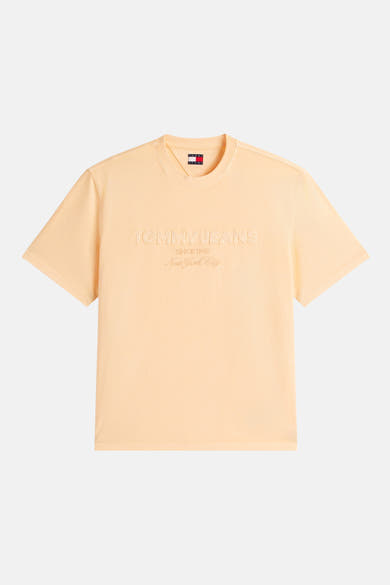 T-shirt orange à manches courtes de TOMMY JEANS, avec inscription ton sur ton sur le devant.