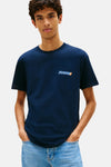 Marineblauw T-shirt met korte mouwen van TOMMY JEANS, met een logo op de borst en een decoratief inzetstuk.