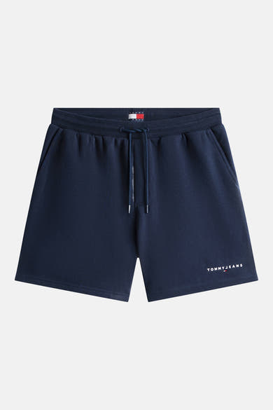 Marineblauwe korte broek van TOMMY JEANS, met trekkoord en opgedrukt merklogo.