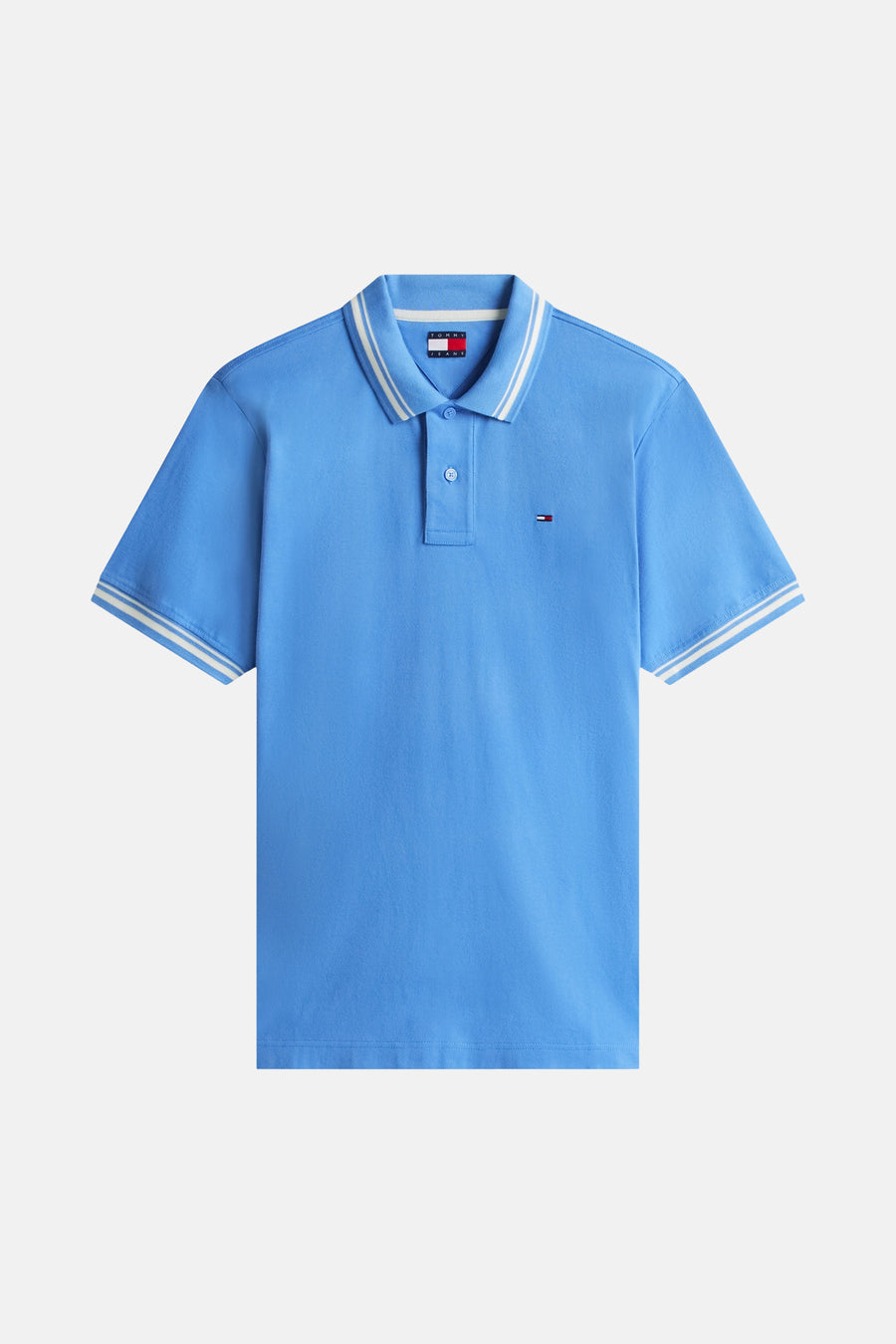 Blauwe polo van TOMMY JEANS met witte gestreepte kraag en mouwen, met twee knopen en een klein geborduurd logo.