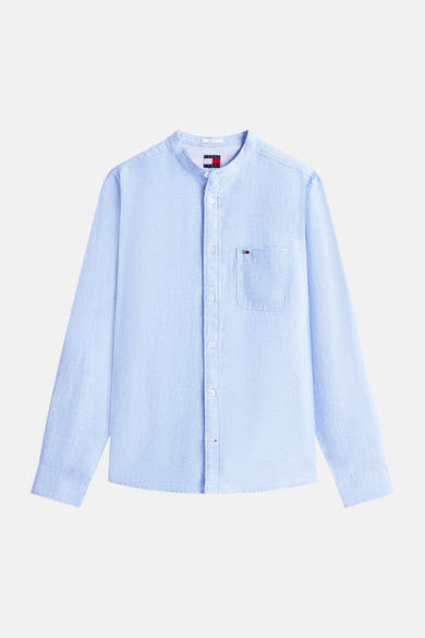 Lichtblauw overhemd met lange mouwen van TOMMY JEANS, met borstzak en knoopsluiting.