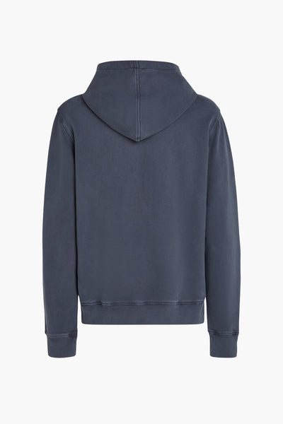 Blauwe Tommy Jeans hoodie, achterkant, met klassieke capuchon en geribbelde boorden.