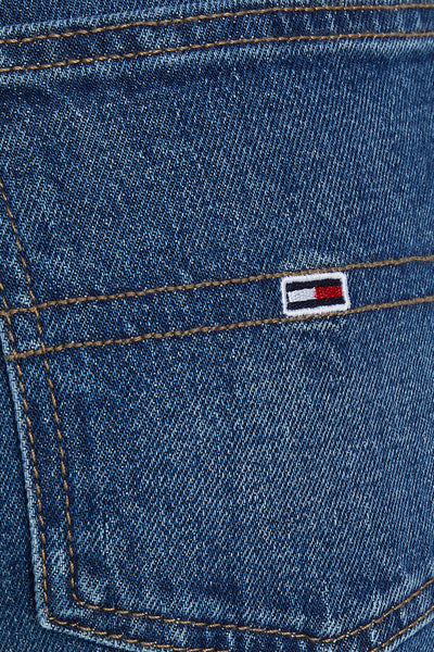 Jean slim en denim bleu foncé de Tommy Jeans avec couture marron et mini logo drapeau.
