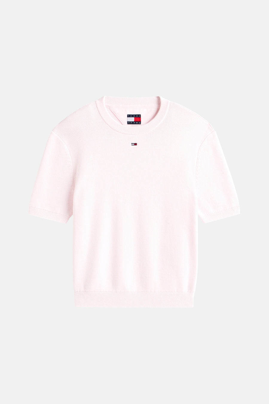 Roze rondehals trui van TOMMY JEANS in fijne brei met discreet logo op de borst.