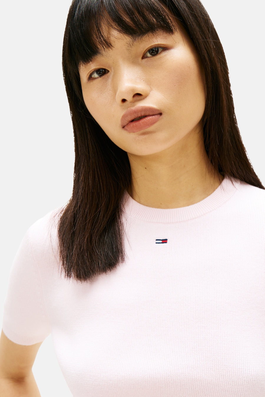 Roze rondehals-trui van TOMMY JEANS, in ribgebreide stof met discreet logo.