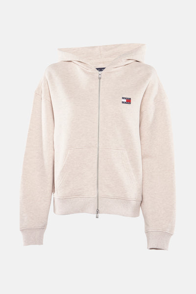 Polaire beige de TOMMY JEANS, avec fermeture éclair et capuche, poche kangourou visible.