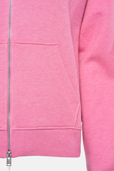 Roze fleece van TOMMY JEANS met zilveren ritssluiting en zakken.