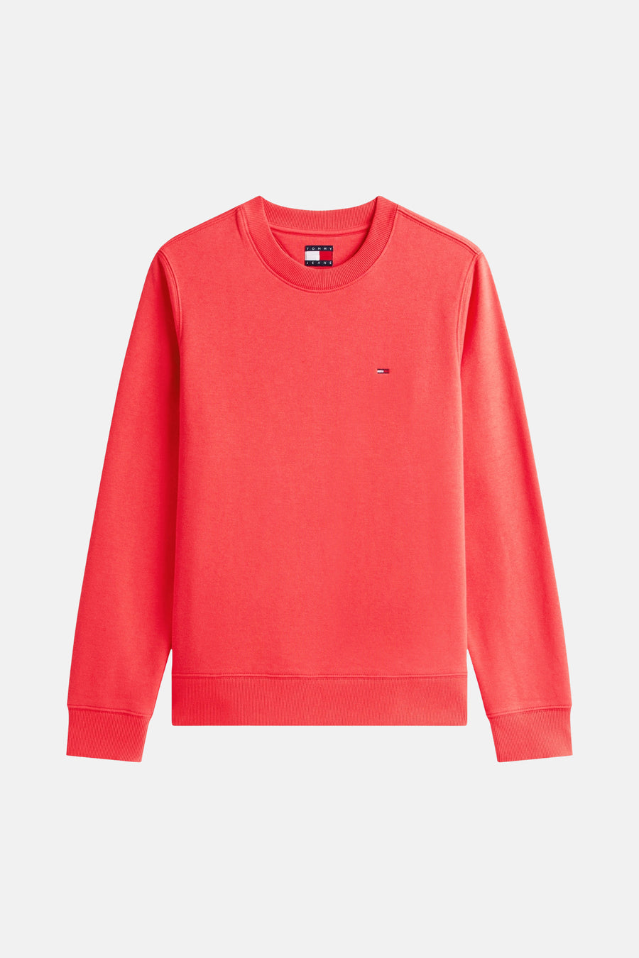 Sweat rouge de TOMMY JEANS, avec logo drapeau discret sur la poitrine.