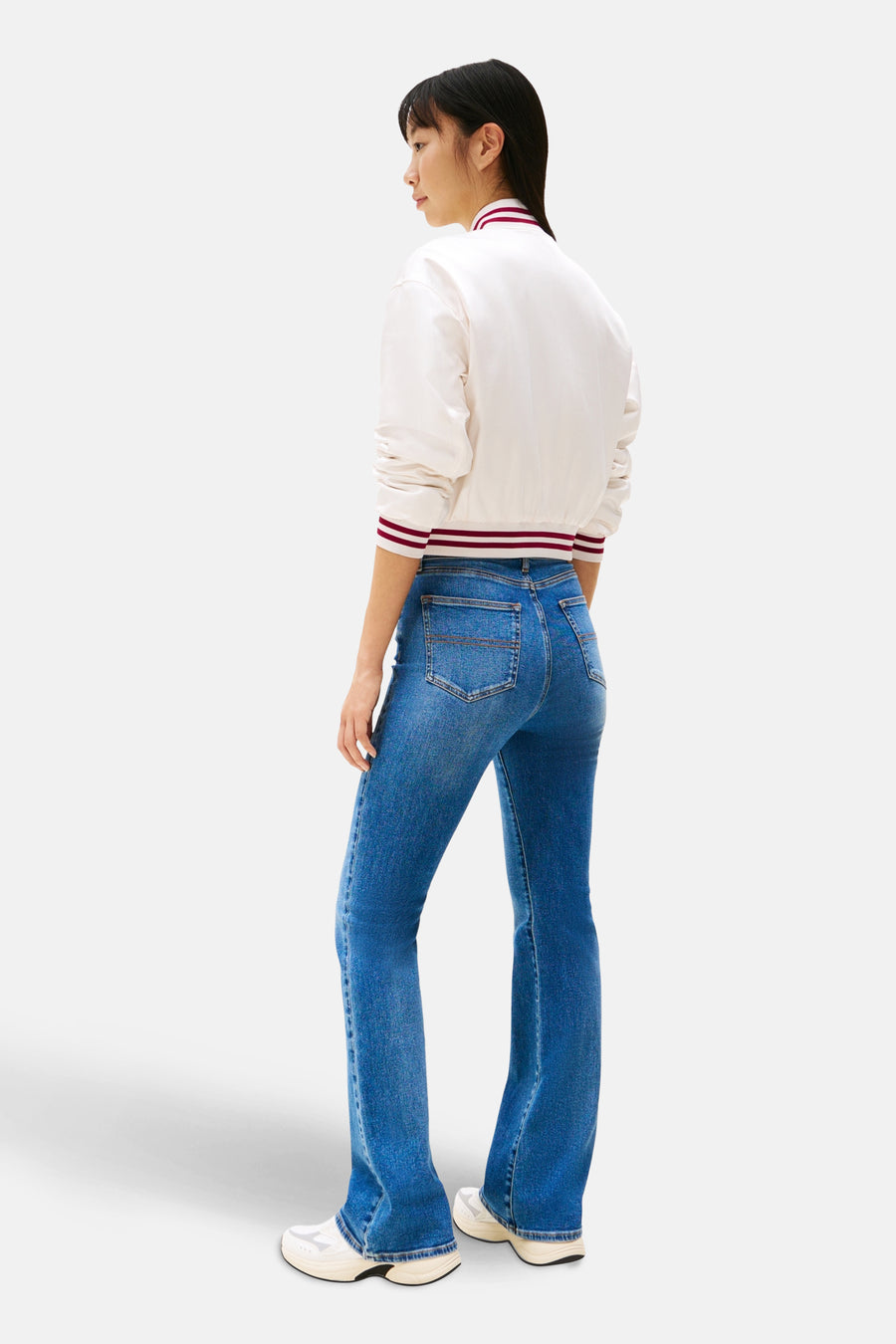 Uitlopende jeans van middendonker denim van TOMMY JEANS, met achterzakken en uitlopende zomen.