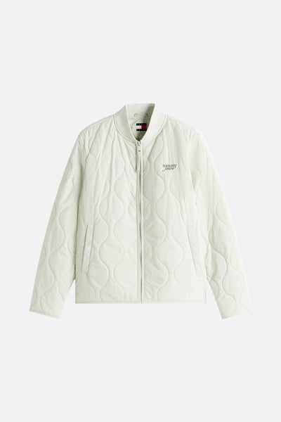 Kort lichtgroen jasje van TOMMY JEANS met golvend doorgestikt patroon.