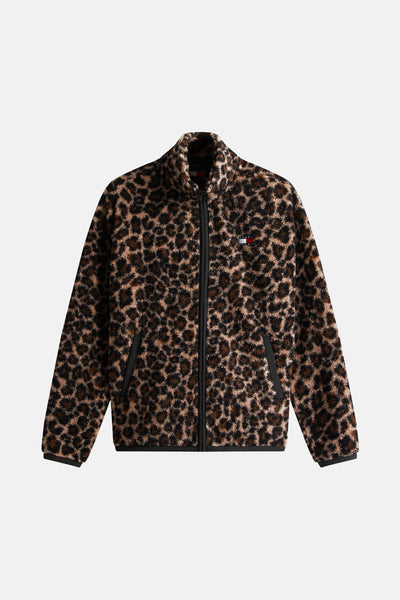 Polaire multicolore de TOMMY JEANS, à motif léopard, avec fermeture éclair sur fond blanc.
