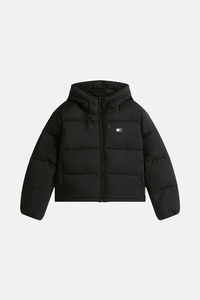 Veste courte noire de TOMMY JEANS, matelassée avec capuche et fermeture éclair intégrale.