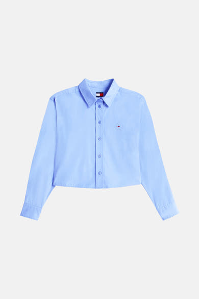 Blauwe blouse met lange mouwen van Tommy Jeans met discreet logo op de borst en korte pasvorm.