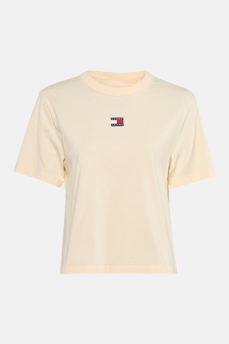 T-shirt jaune à manches courtes de TOMMY JEANS avec logo drapeau sur la poitrine.