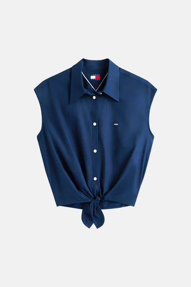 Blauw mouwloos overhemd van TOMMY JEANS, met knoopsluiting en strikdetail aan de taille.
