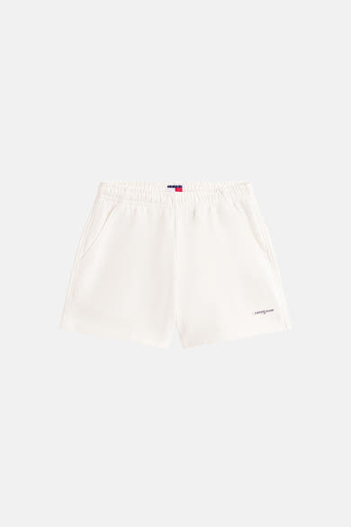 Kort wit T-shirt van TOMMY JEANS, met elastische tailleband, zijzakken en logo op het been.