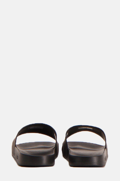 Zwarte teenslippers van Tommy Jeans, van achteren gezien.