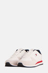 Baskets blanches de TOMMY JEANS, avec empiècements contrastants marine et rouge sur une semelle sportive.