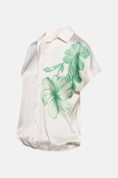 Ecru blouse met korte mouwen van AMELIE ET AMELIE, met groen bloemenpatroon, zijaanzicht.