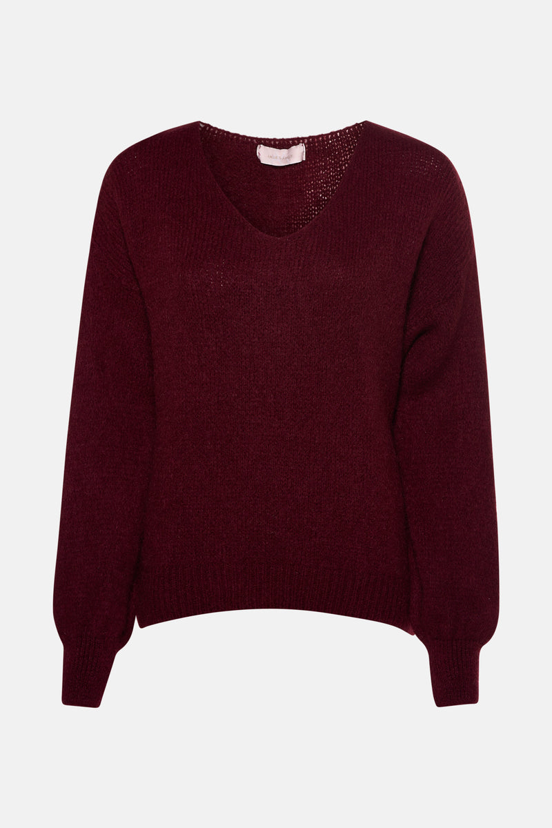 Pull col V rouge bordeaux de AMELIE ET AMELIE en maille fine.