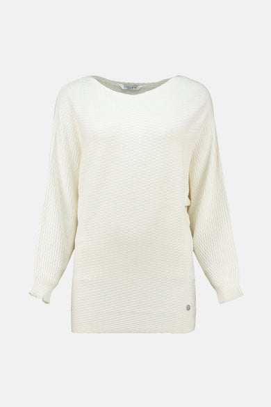 Pull à col rond blanc de Zabaione, texture gaufrée sur toute la surface.