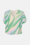 Blouse à manches courtes multicolore d'AMELIE ET AMELIE avec motif ondulé abstrait vert, bleu et jaune.
