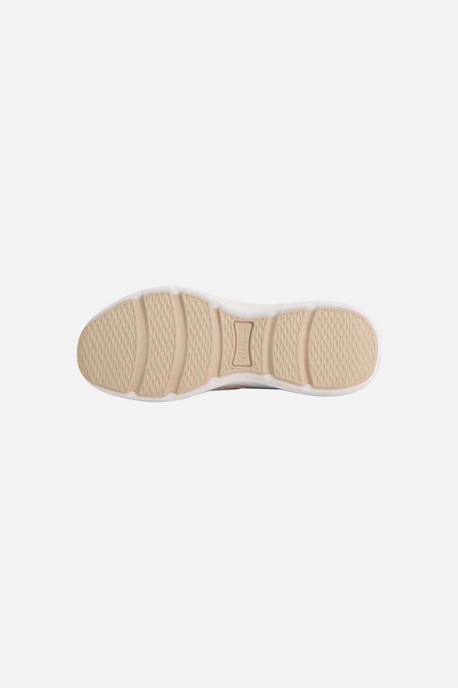 Baskets beige de Guess, vue de dessous avec semelle texturée et logo Guess embossé.