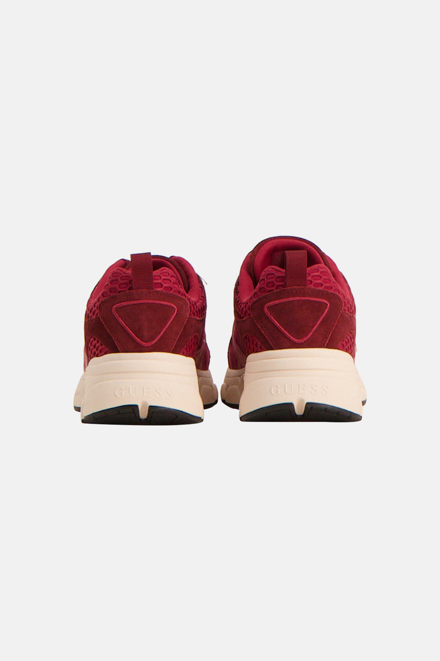 Red suede and mesh sneakers by GUESS, back view with cream midsole and embossed logo, textured heel panel.